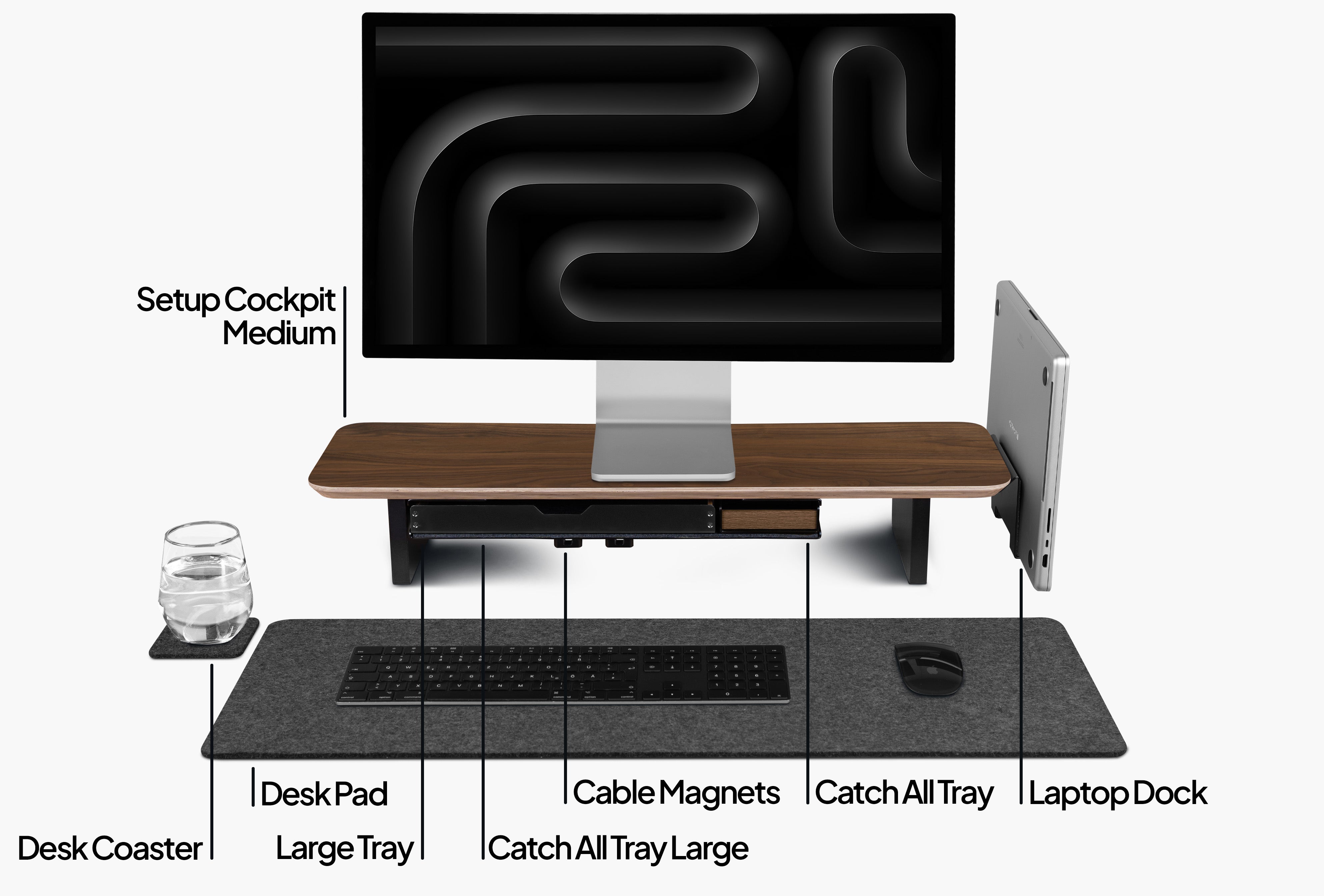 Setup Cockpit Desk Shelf Medium in American Walnut, as a bundle set with add-ons: Laptop Dock, Large Tray, Catch all Trays, cable magnets and desk pad. Labeled for illustration purposes.
